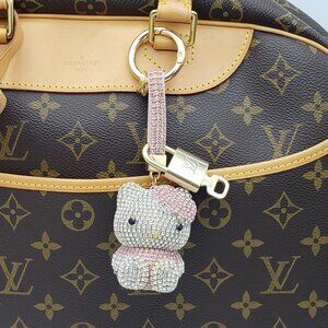 Authentic Louis Vuitton Lock & Key with Unbranded Hello kitty Charm, Keychain